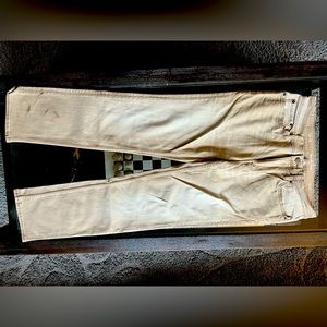 Stretchy faded tan skinny jeans